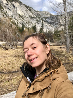 Selfie of Nataliia with mountains on the background